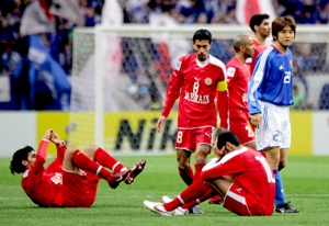 حسرة الخسارة واضحة على لاعبي البحرين
