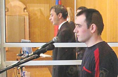 الشيشاني نورباشي كولاييف أثناء محاكمته