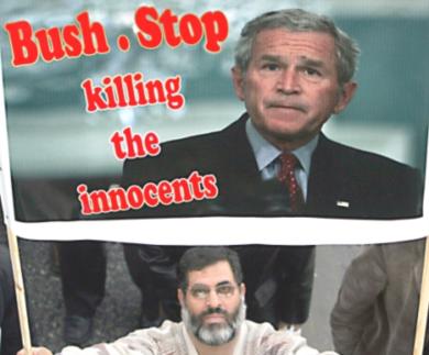 محتج يحمل صورة الرئيس الامريكي جورج بوش وكتب عليها "بوش توقف عن قتل الأبرياء "
