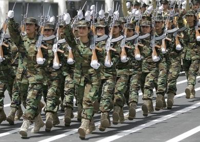 عرض عسكرية لفتيات كرديات أمس