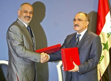 وزير الداخلية التركي بشير أتالاي ونظيره العراقي جواد البولاني