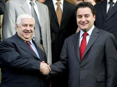 وزير الخارجية السوري وليد المعلم مع نظيره التركي علي باباجان