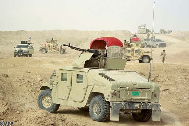 قوات موالية للجيش العراقي تتخذ مواقعها قرب بلدة جرف الصخر