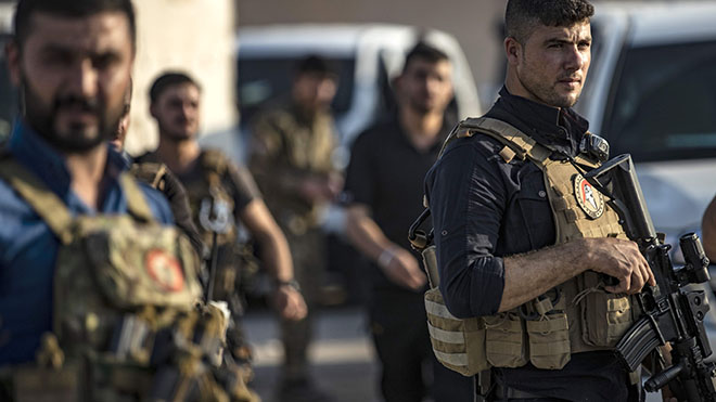 أفراد القوات الخاصة التابعة للقوات الديمقراطية السورية التي يقودها الأكراد