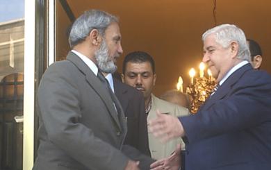 وزير الخارجية السوري وليد المعلم مع نظيره الفلسطيني محمود الزهار
