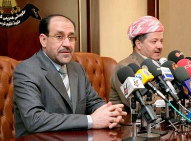 المالكي خلال مؤتمر صحافي مشترك مع رئيس اقليم كردستان مسعود بارزاني