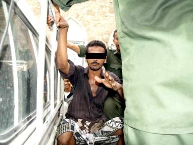 الشاب في قبضة الأمن الشاب في قبضة الأمن