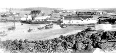 صورة لأحد أرصفة الفحم بالجزيرة التقطت عام 1928م صورة لأحد أرصفة الفحم بالجزيرة التقطت عام 1928م