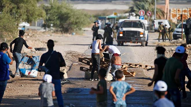 مواجهات جرت الاربعاء 24 يونيو الحالي بين فلسطينيين وقوات اسرائيلية في وادي الاردن ضد مخطط ضم الضفة copy مواجهات جرت الاربعاء 24 يونيو الحالي بين فلسطينيين وقوات اسرائيلية في وادي الاردن ضد مخطط ضم الضفة copy